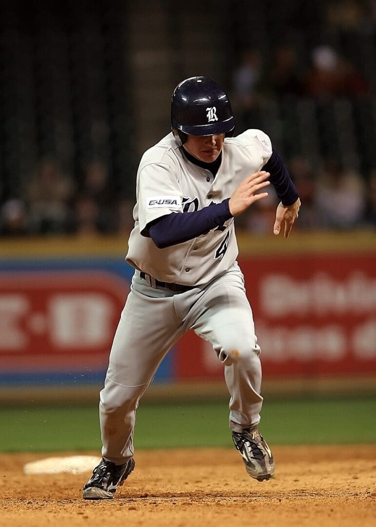 A baseball player running on the field